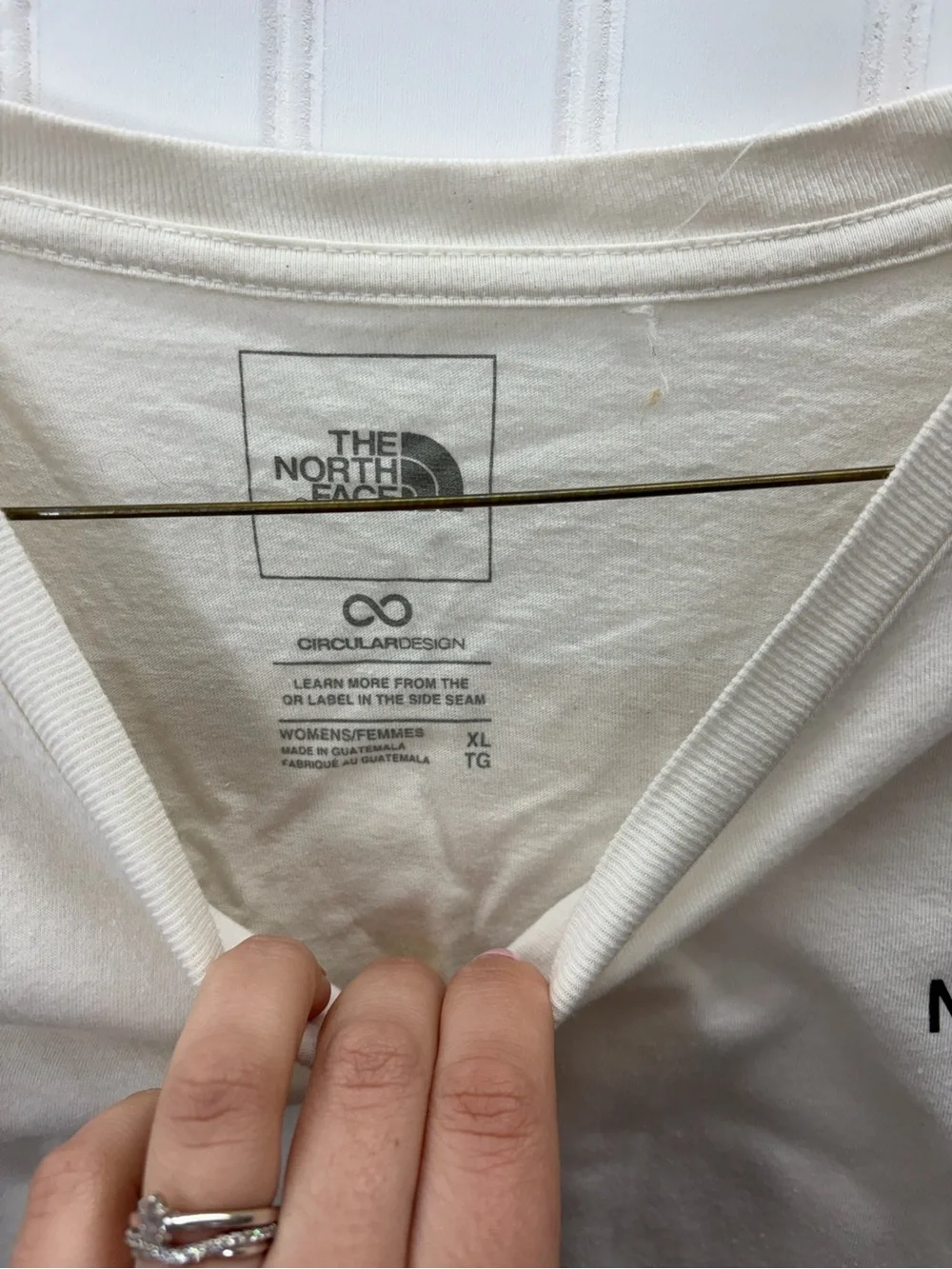 The North Face Men’s Cream Short-Sleeve Logo Tee with Black Chest Emblem